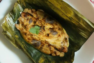 Baked Paddy Straw Mushroom in Banana Leaf (Pala Chatu Patra Poda) - Fresh Trove - By Sukamani Heritage Farm